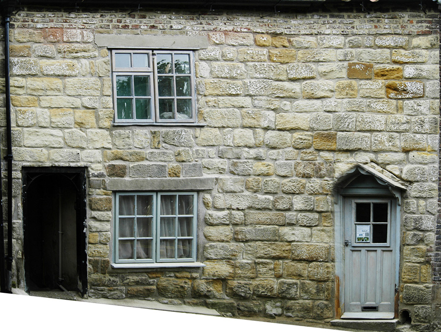 front showing stone and brick courses